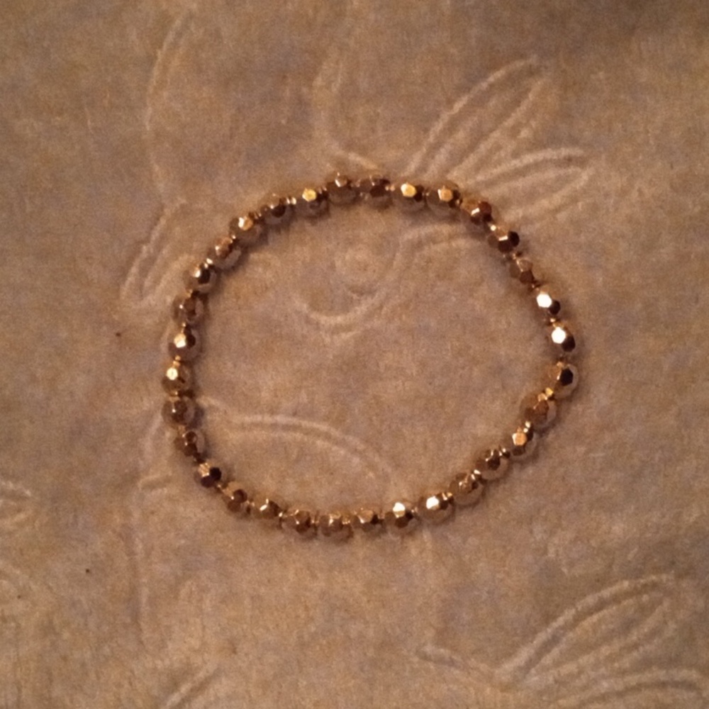 Minimalist handmade shiny and metallic fun casual silver bracelet